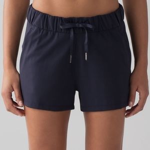 Lululemon On The Fly shorts size 8 in EUC in Navy